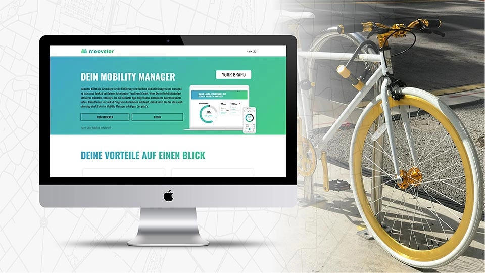 Ein Bildschirm auf der Linken Seite und ein weißes Fahrrad auf der rechten Seite des Bildes. Auf dem Bidschirm steht "Dein Mobility Manager, deine Vorteile auf einen Blick"
